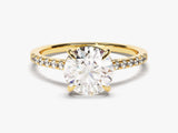 Oval diamond engagement ring with pave band