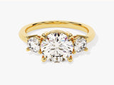 Gold three-stone diamond engagement ring