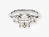 Oval diamond engagement ring with side stones