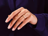 Diamond band ring on a woman's hand, fine jewelry