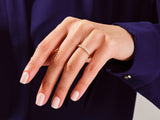 Diamond band ring on a woman's hand, fine jewelry