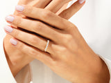 Diamond band ring on a woman's hand, jewelry product photography