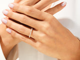Diamond eternity ring on a woman's hand