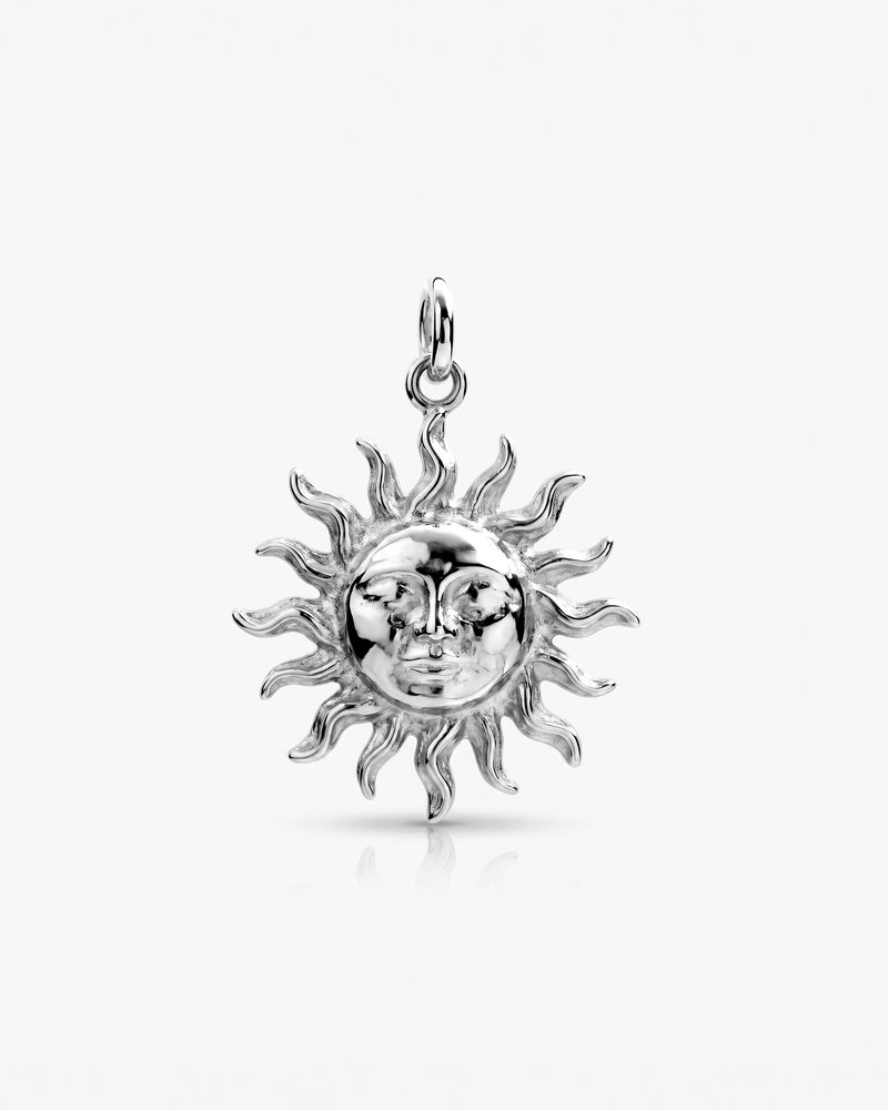Sunface Charm in white gold and silver