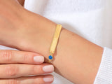 Gold bar bracelet with blue gemstone and personalized name Amanda