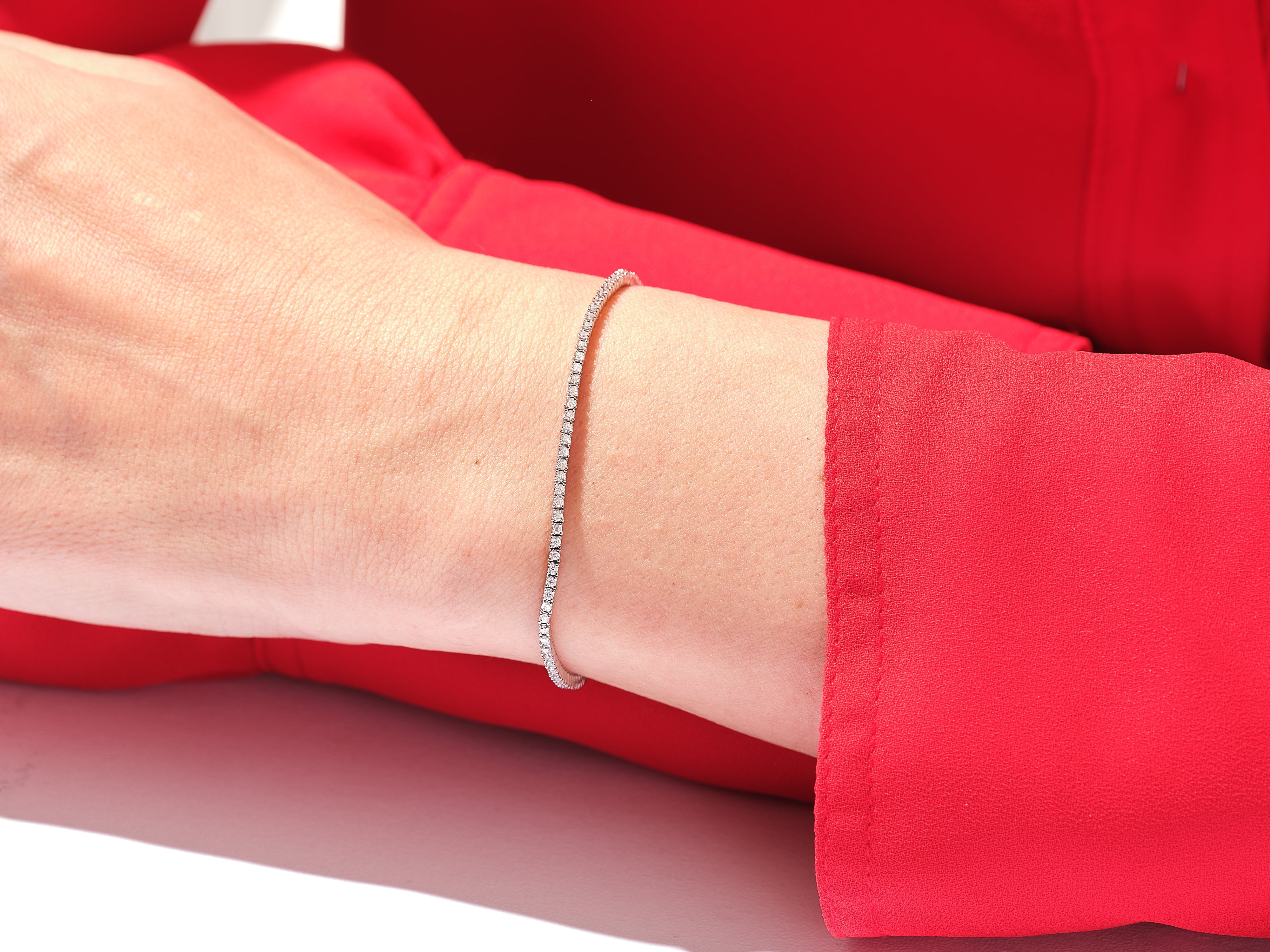 Diamond tennis bracelet on a wrist, jewelry for her