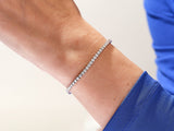 Diamond tennis bracelet on a wrist, jewelry for women