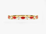 Gold ring with alternating marquise rubies and round diamonds