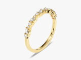 Gold diamond band ring with marquise and round stones