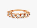 Rose gold ring with heart-shaped diamonds