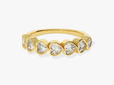 Gold ring with heart-shaped diamonds