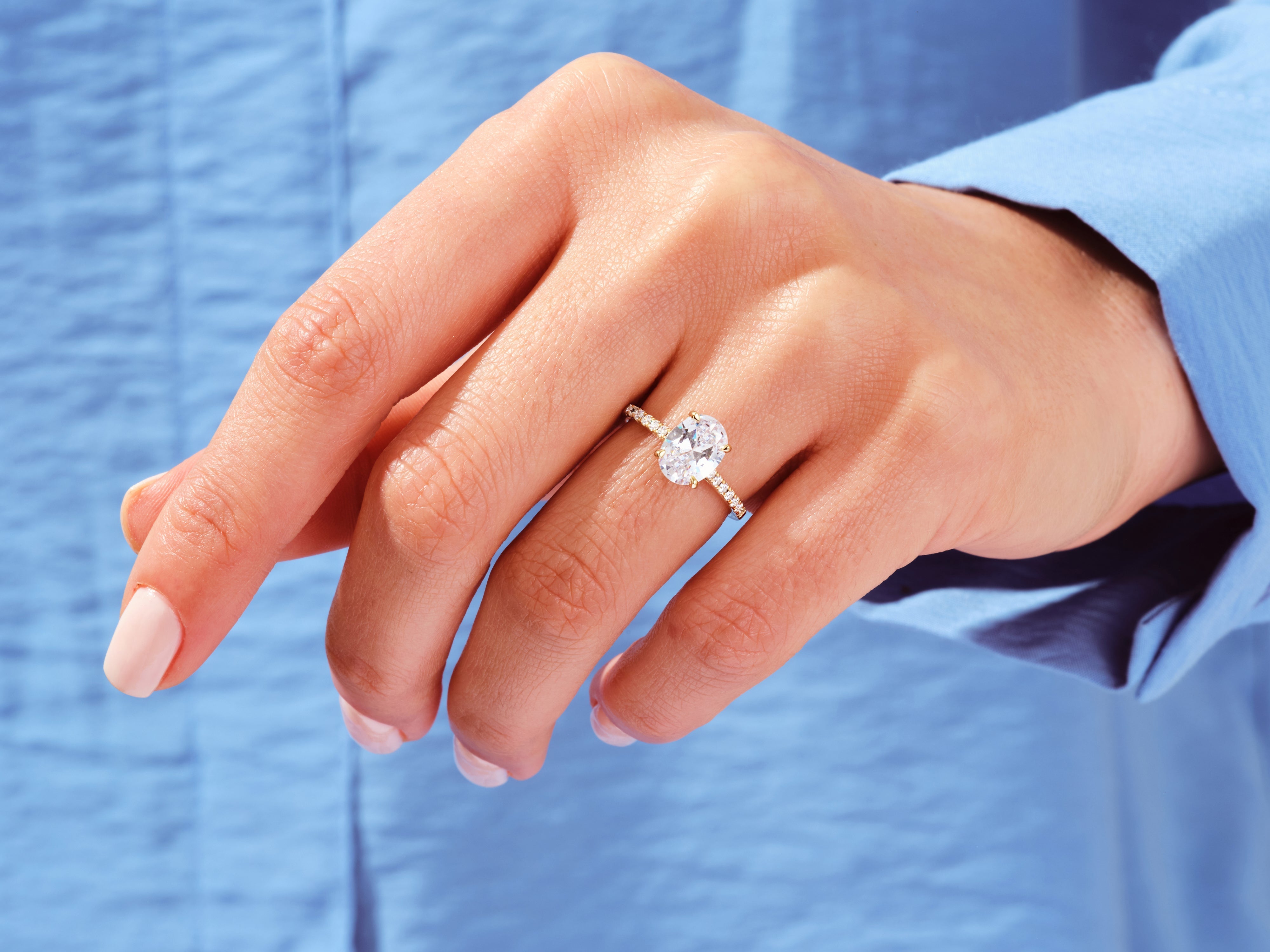 Cathedral Oval Cut Diamond Engagement Ring with Pave Set Side Stones (3.00 CT)