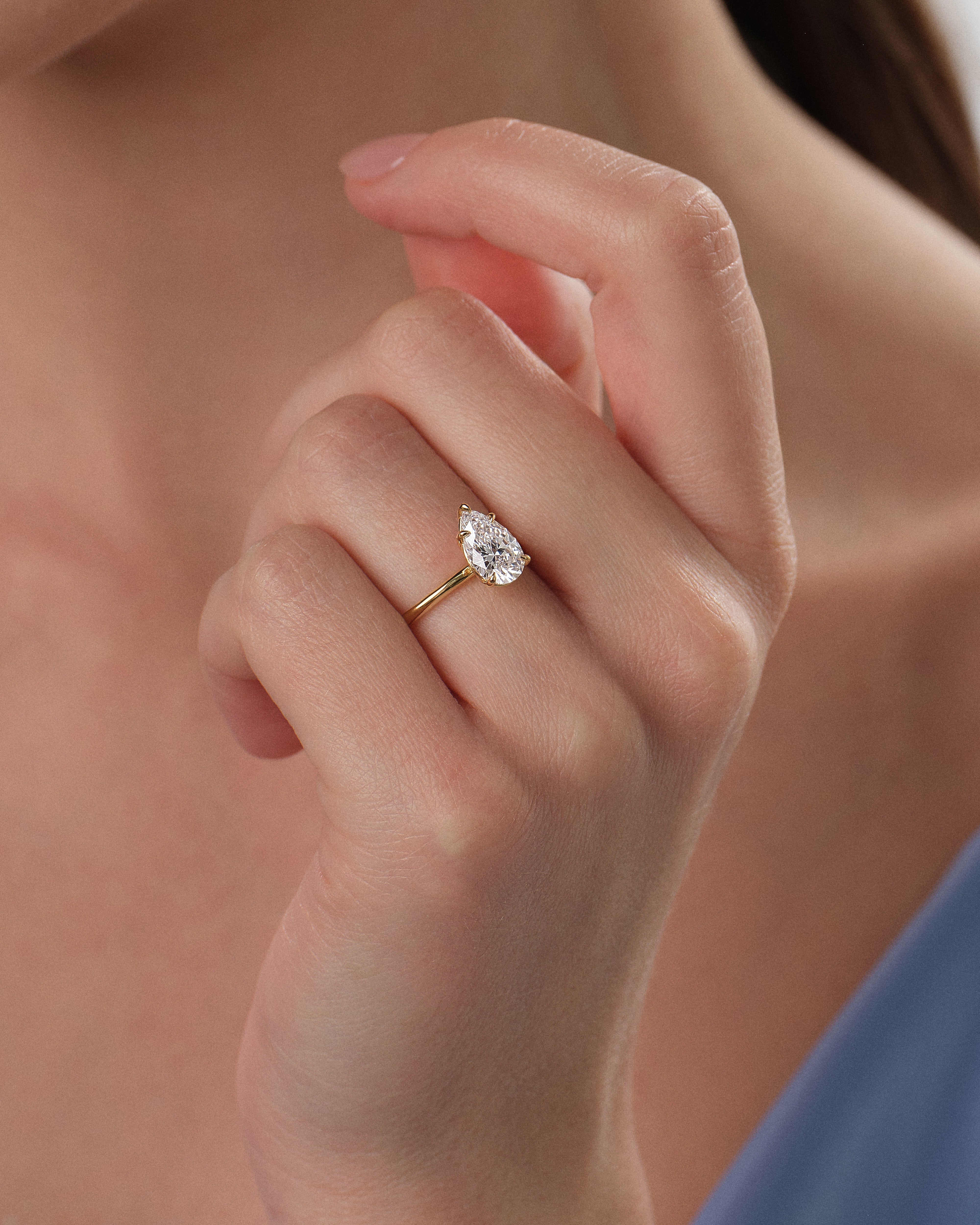 Pear Cut Solitaire Moissanite Engagement Ring (1.50 CT)