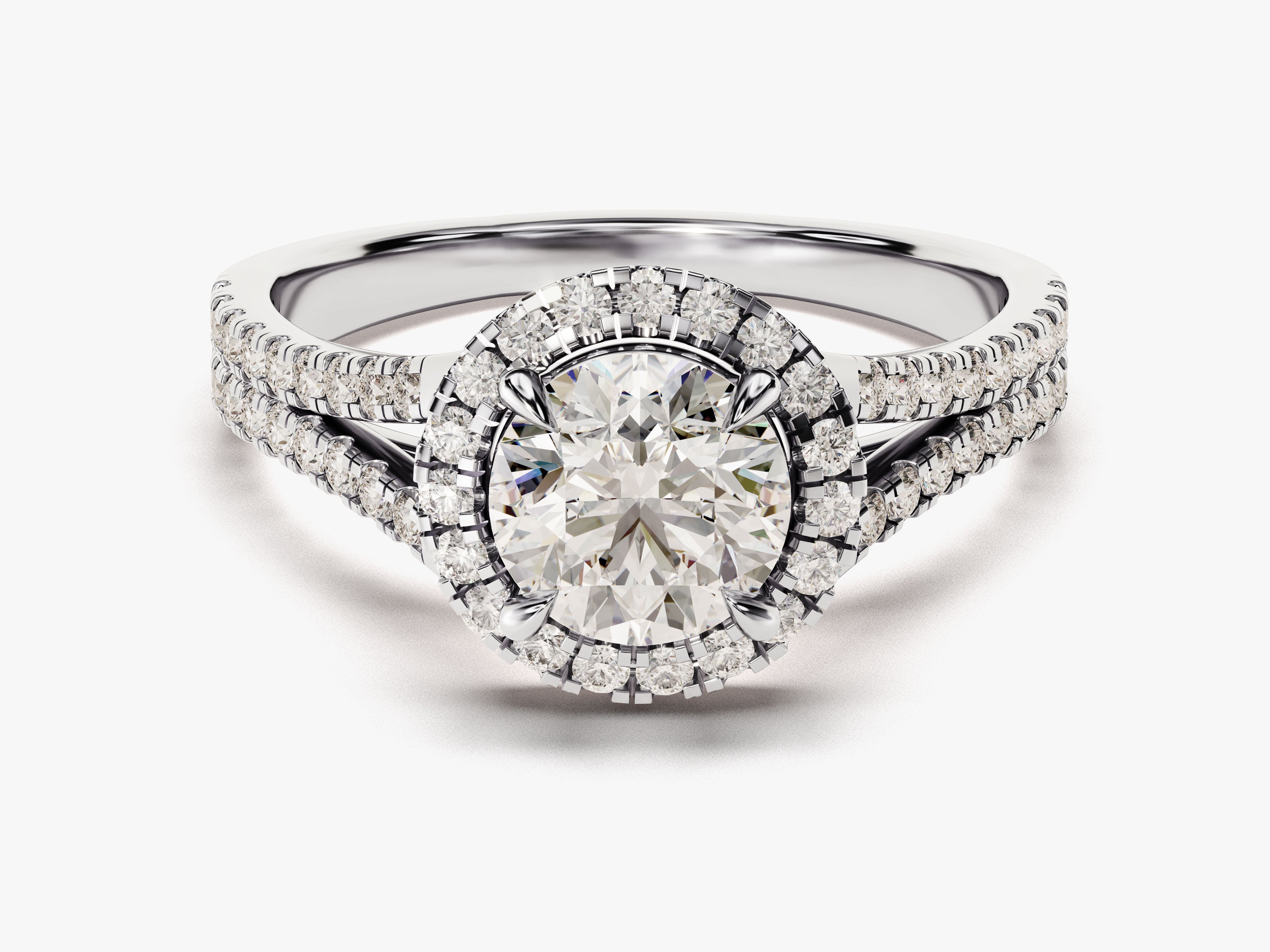 Diamond halo engagement ring with pave band