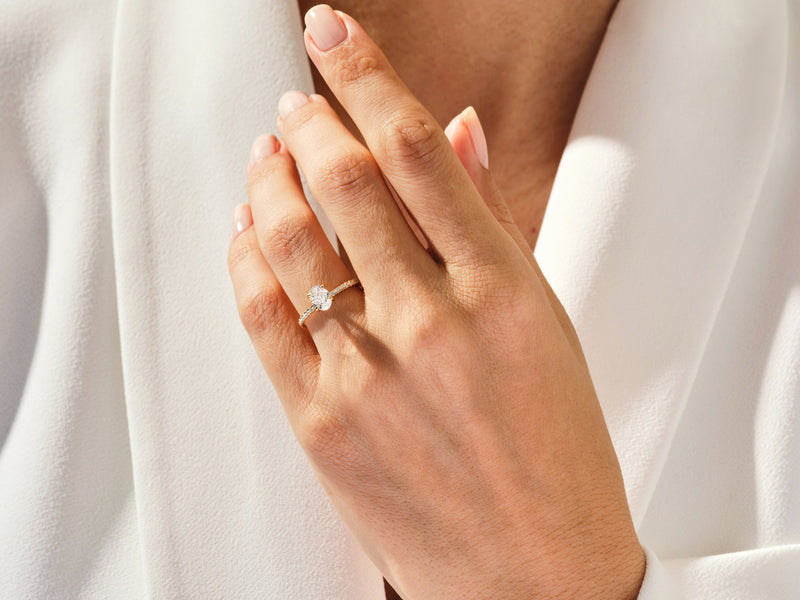 Hidden Halo Oval Diamond Engagement Ring with Sidestones (1.00 CT)