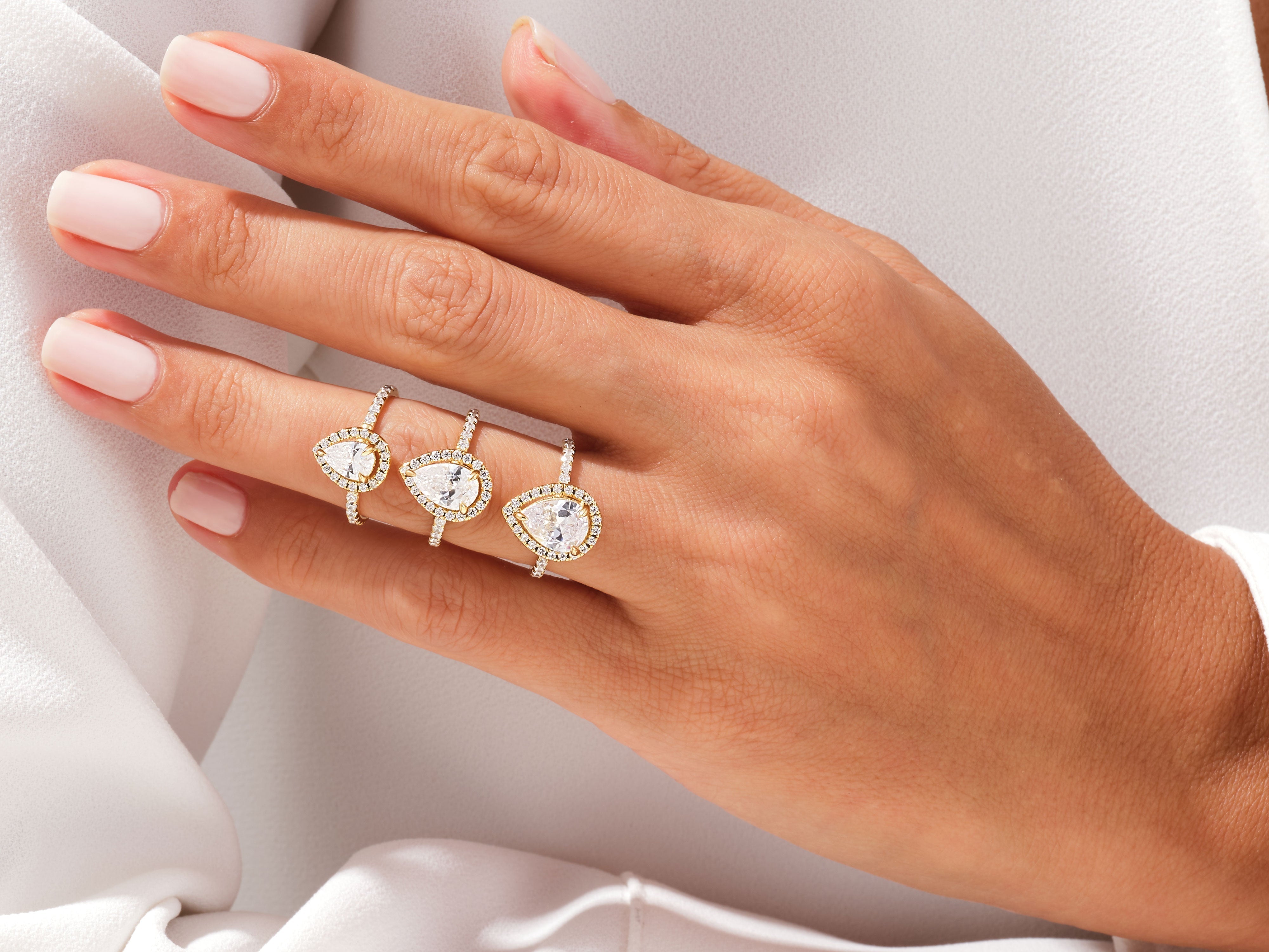 Pear Halo Diamond Engagement Ring with Pave Set Side Stones (1.50 CT)