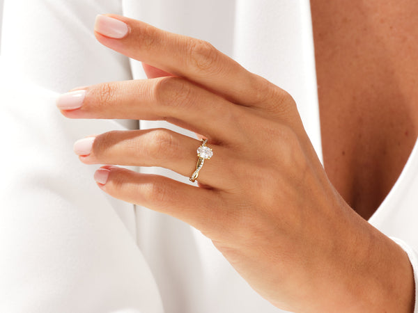 Oval Twisted Moissanite Engagement Ring with Pave Set Side Stones (1.00 CT)