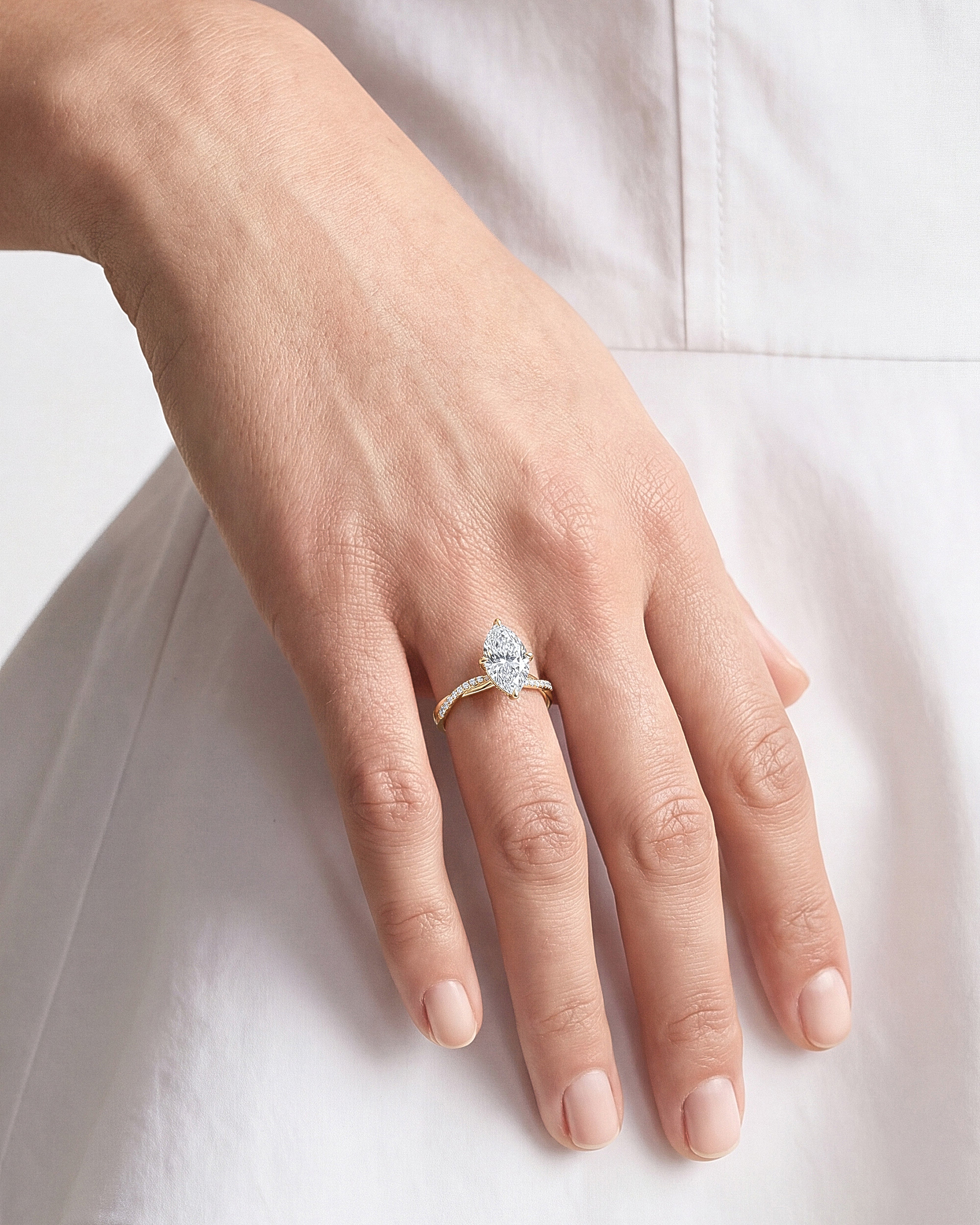 Marquise Twisted Lab Grown Diamond Engagement Ring with Pave Set Side Stones (3.00 CT)