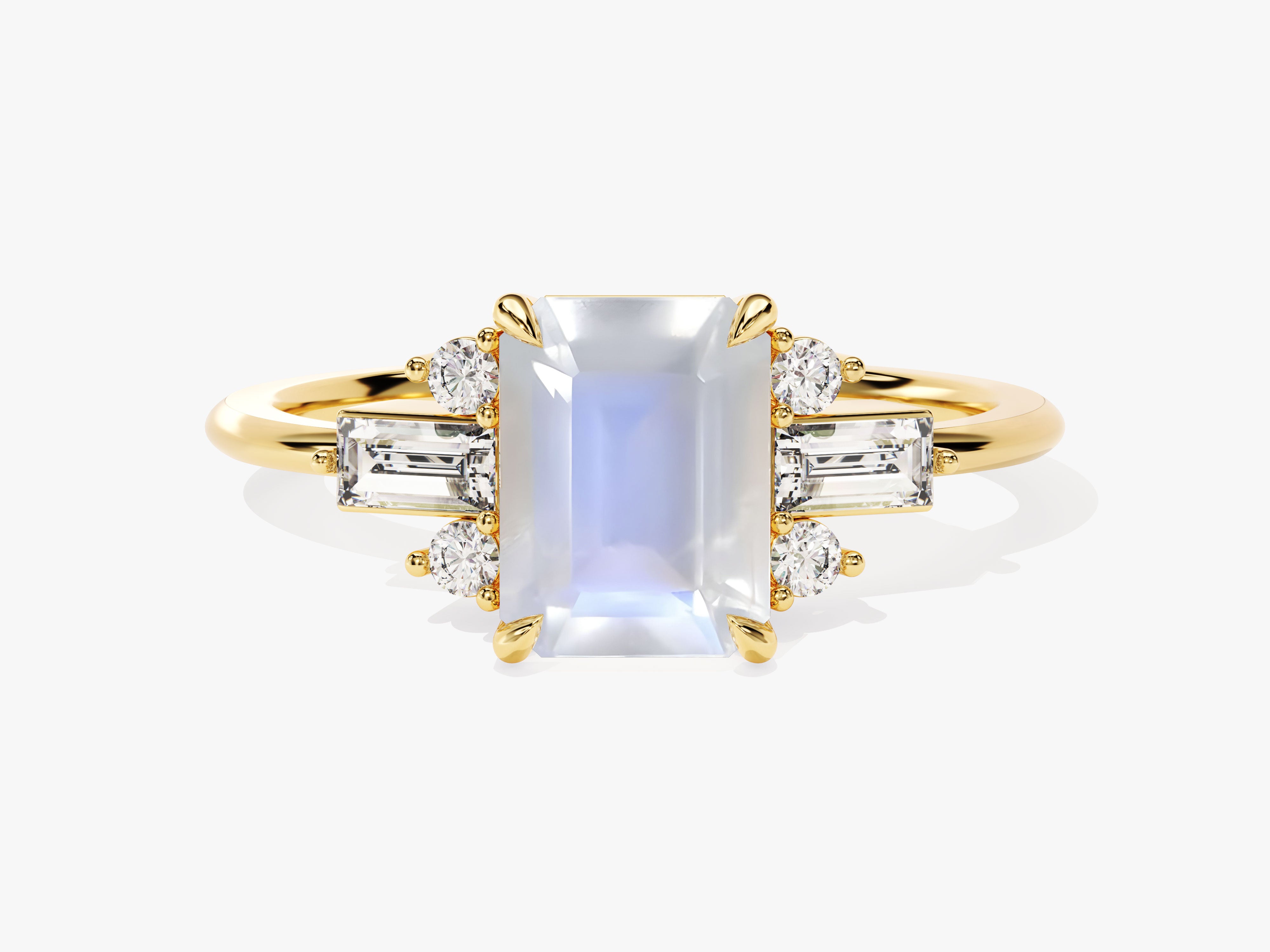 Gold ring with emerald cut moonstone and baguette diamonds