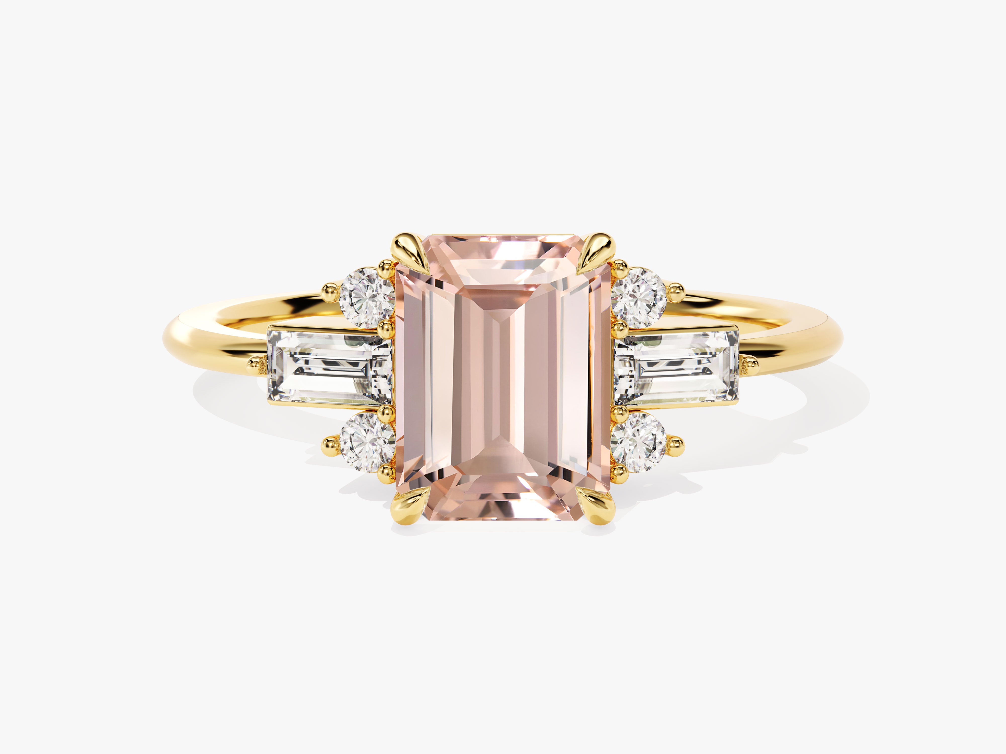 Emerald cut morganite ring with diamond accents on gold band