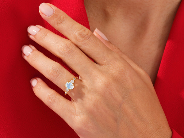 Oval Moonstone Engagement Ring with Moissanite Sidestones