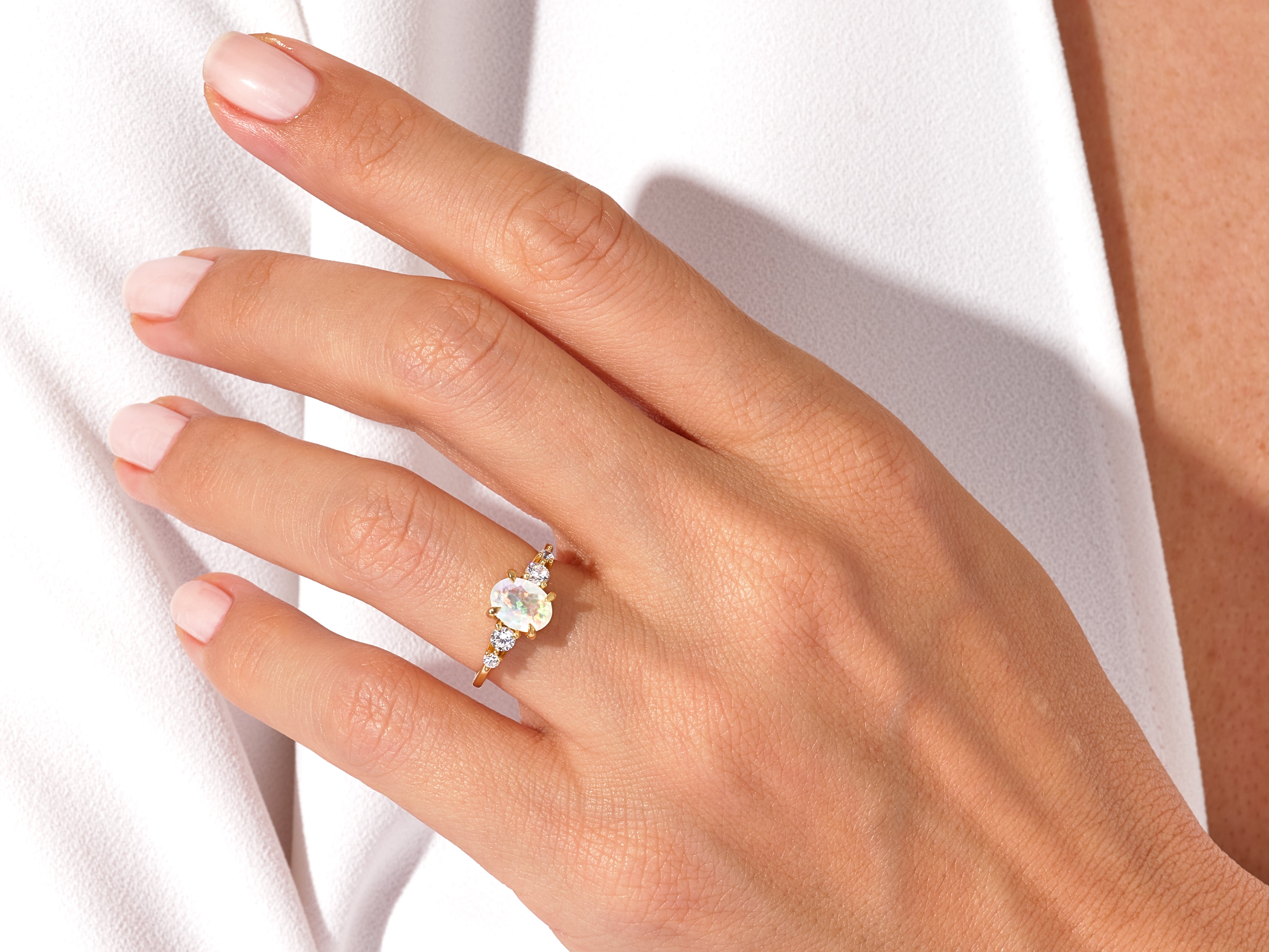 Oval Opal Engagement Ring with Moissanite Sidestones