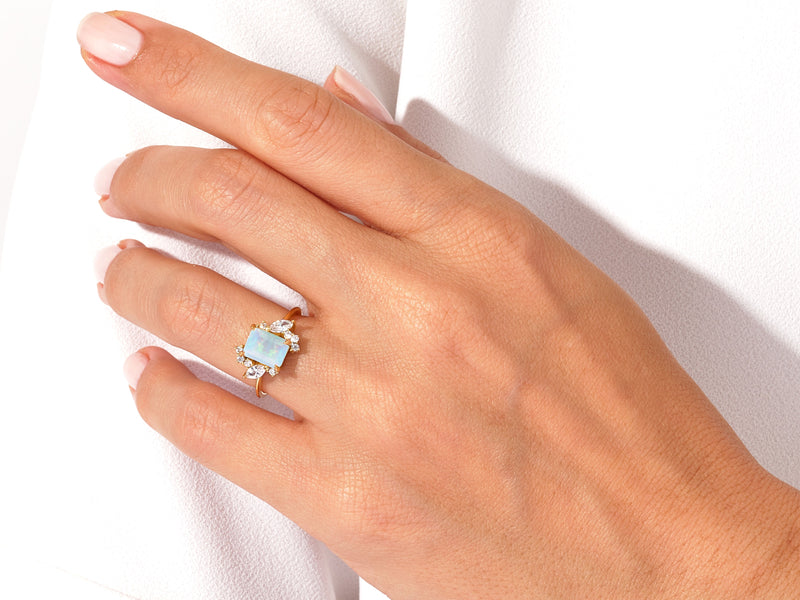 Emerald Cut Opal Engagement Ring with Marquise and Round Moissanite Sidestones