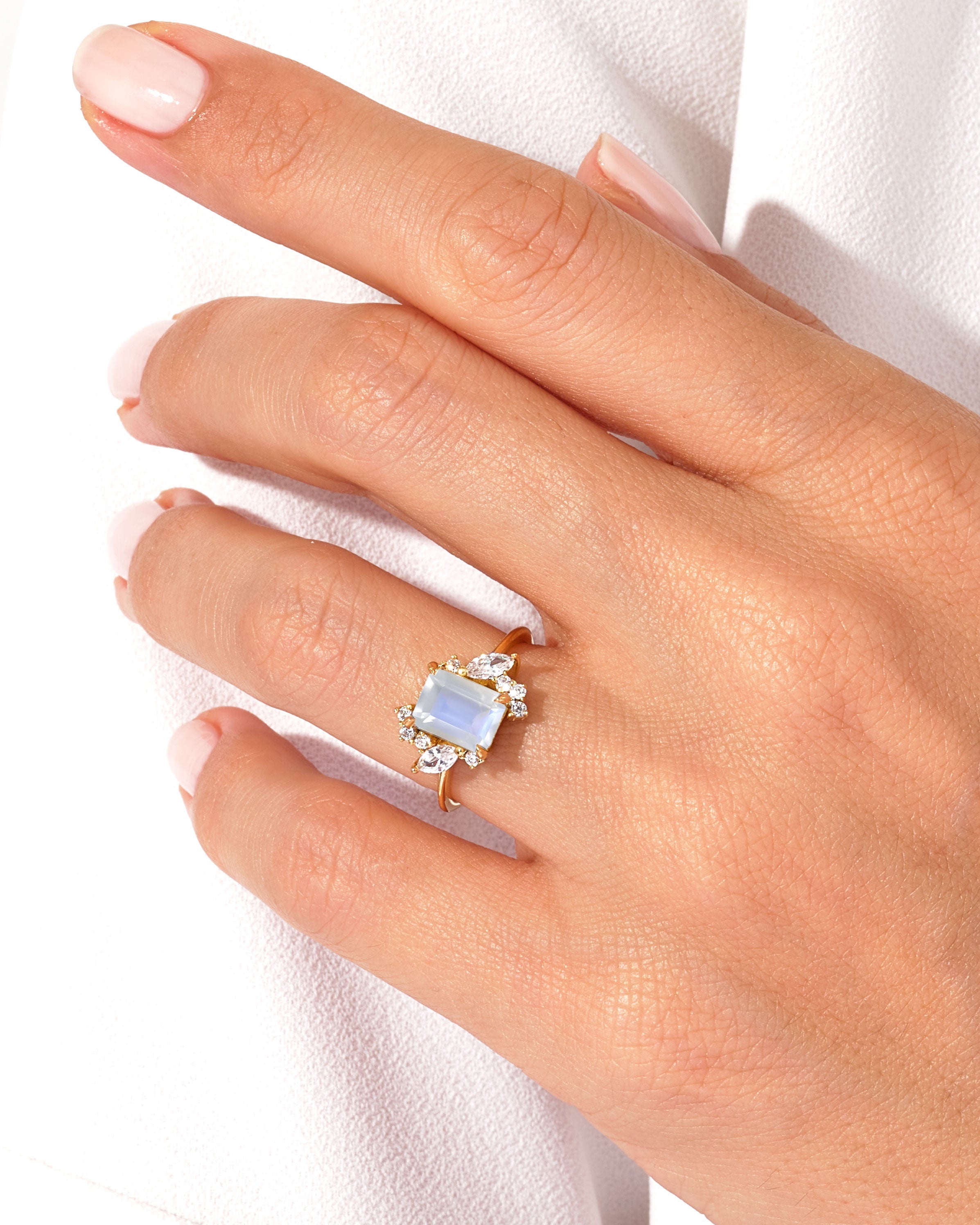 Emerald Cut Moonstone Engagement Ring with Marquise and Round Moissanite Sidestones