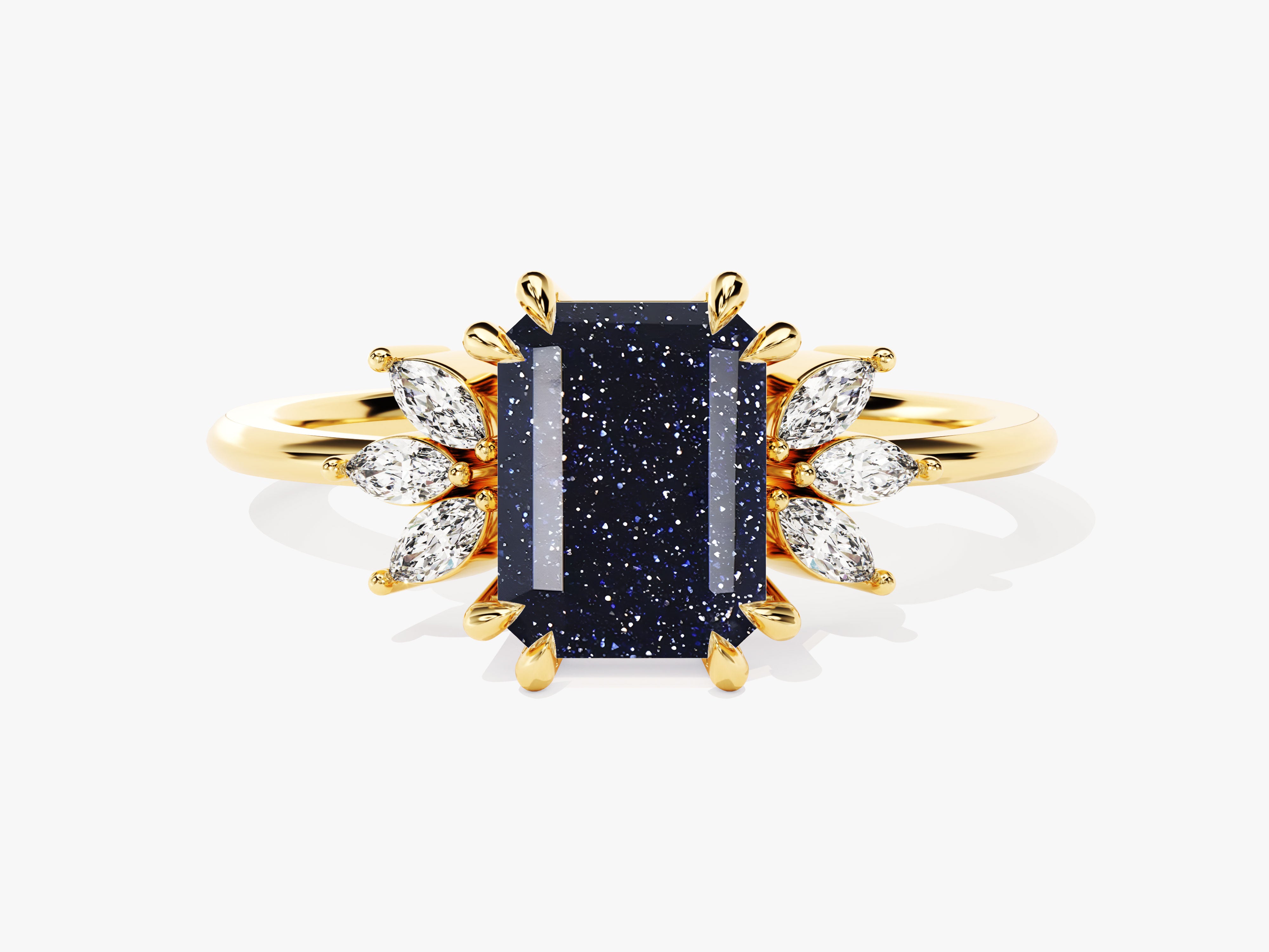 Gold ring with emerald cut blue sandstone and diamond accents