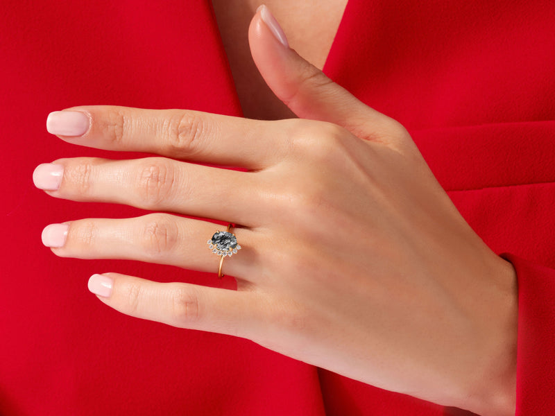 Oval Black Rutilated Quartz Engagement Ring with Round Moissanite Sidestones