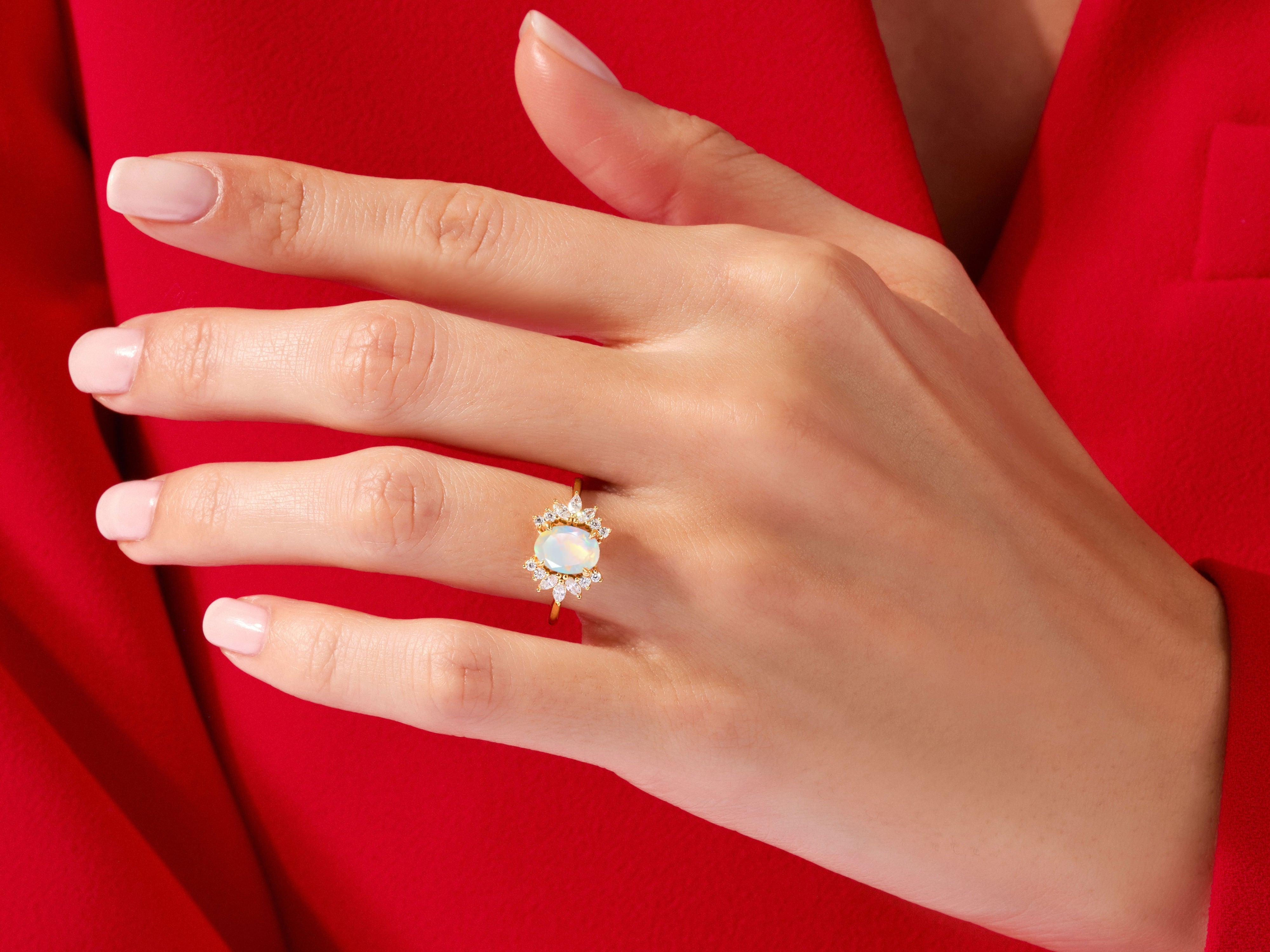 Oval Opal Engagement Ring with Moissanite Cluster