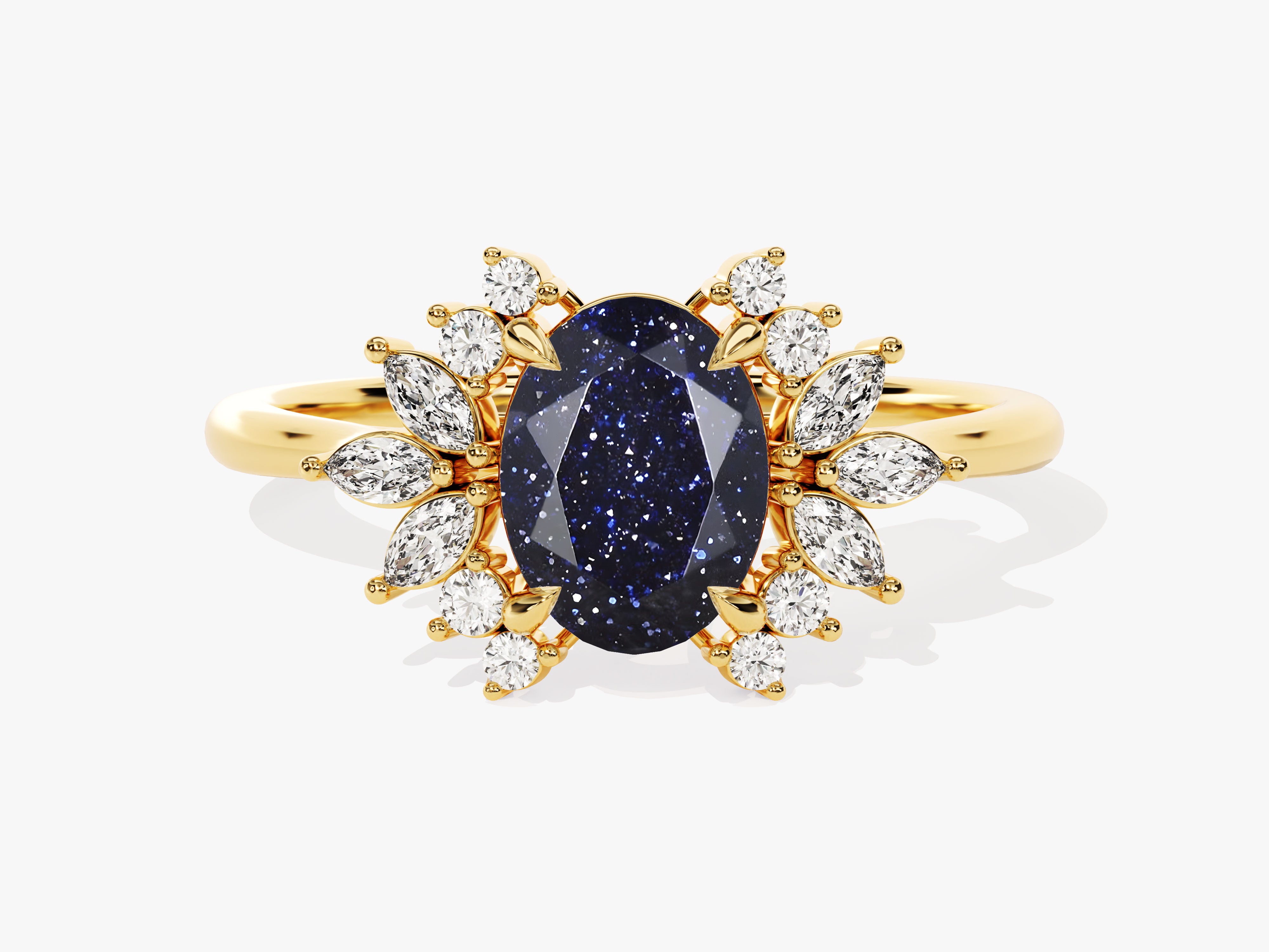 Gold ring with oval blue sandstone and diamond accents