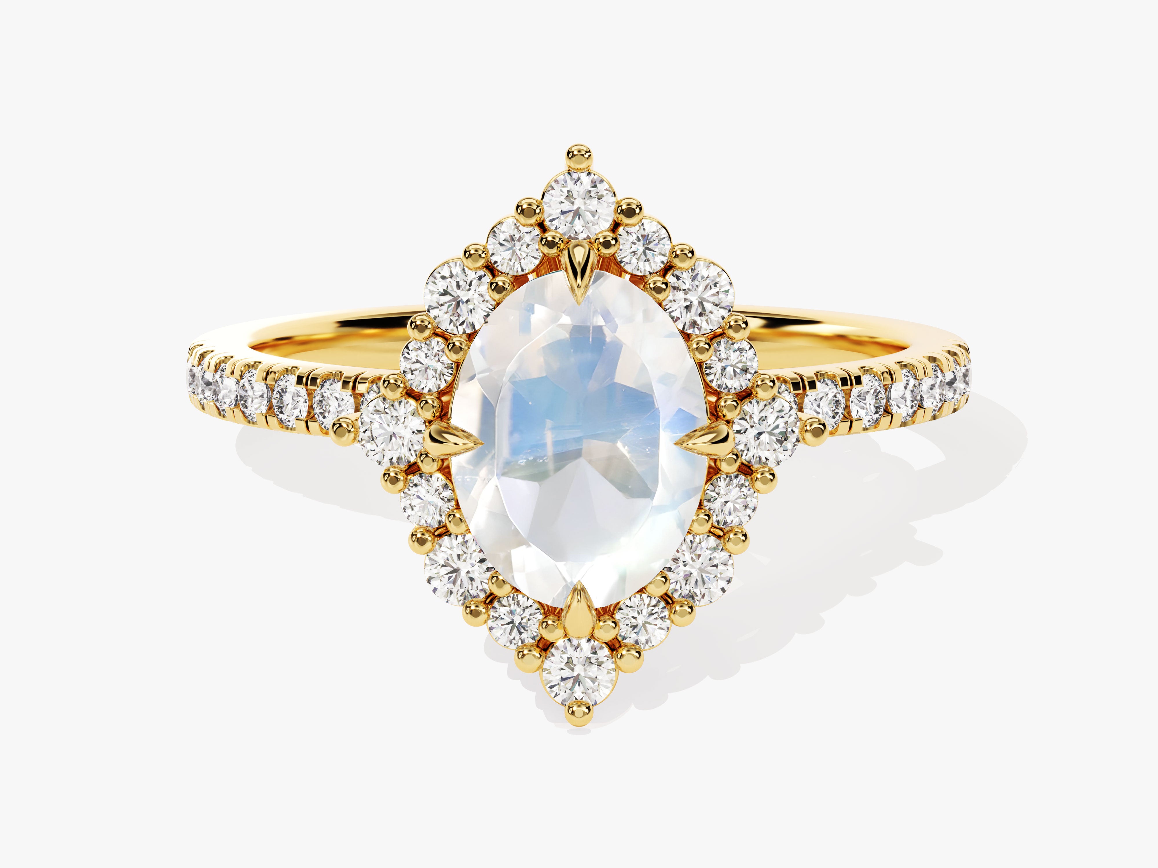 Gold marquise moonstone ring with diamond halo and band