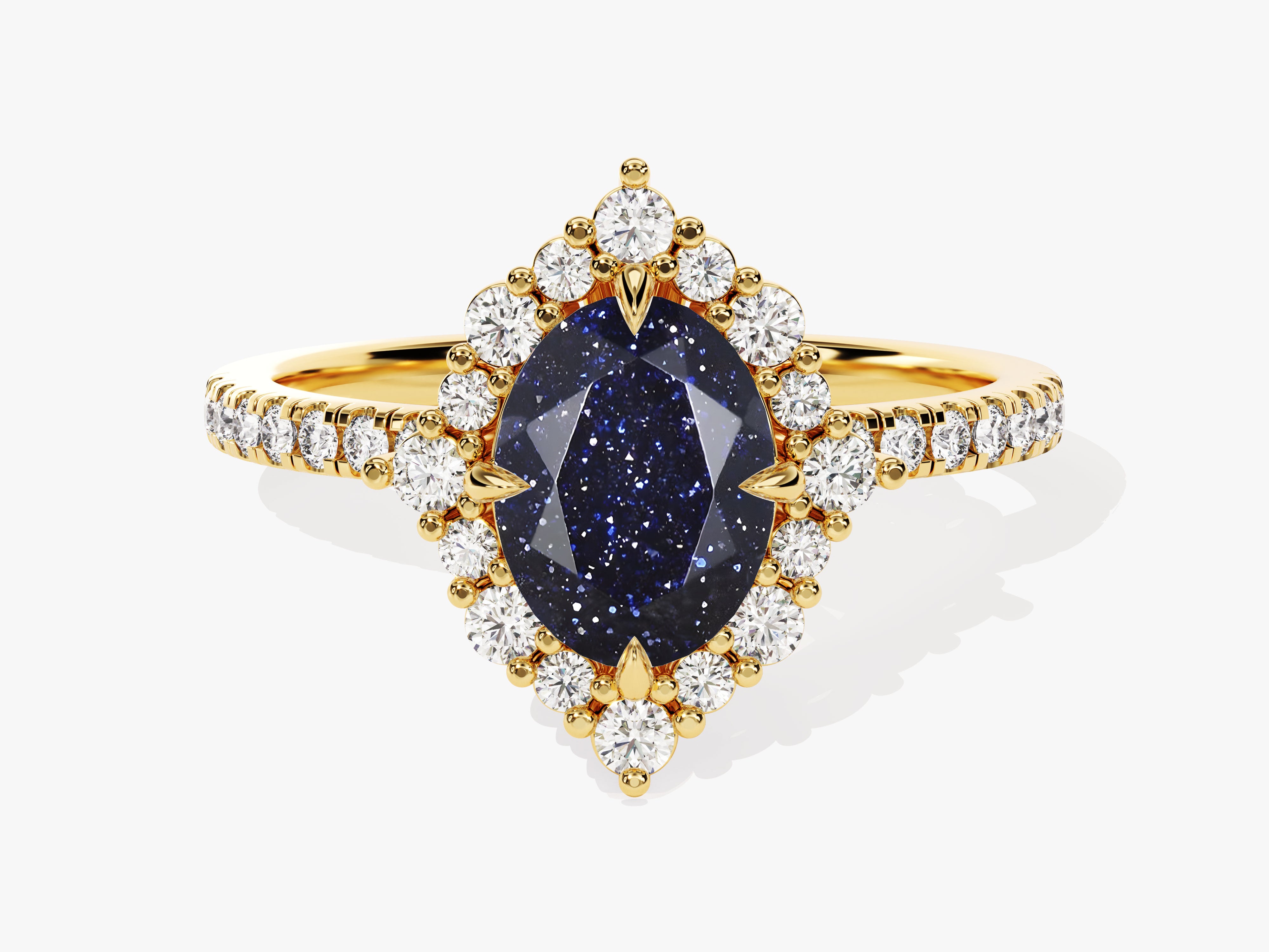 Gold ring with oval blue gemstone and diamond halo