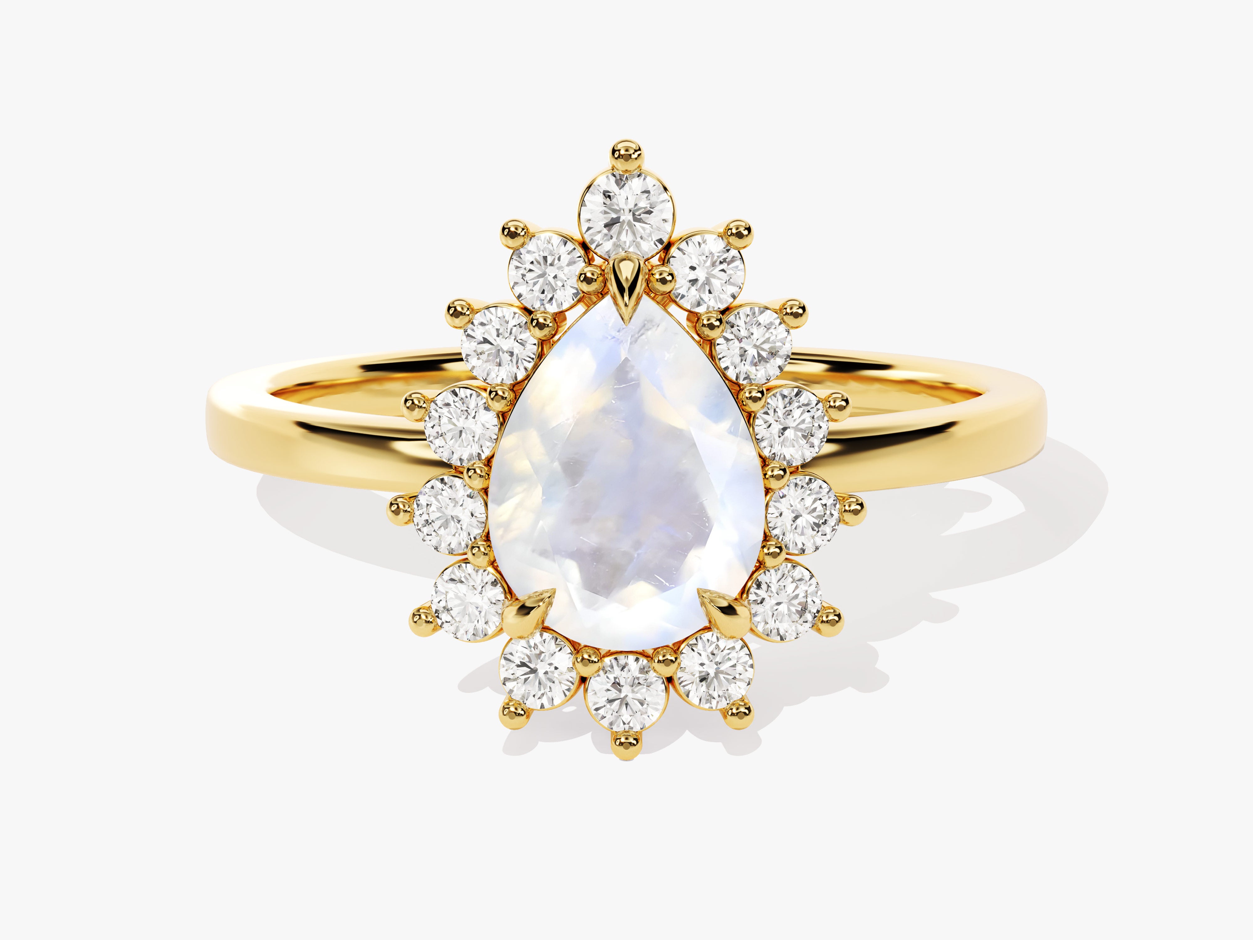 Gold ring with pear-shaped moonstone and diamond halo