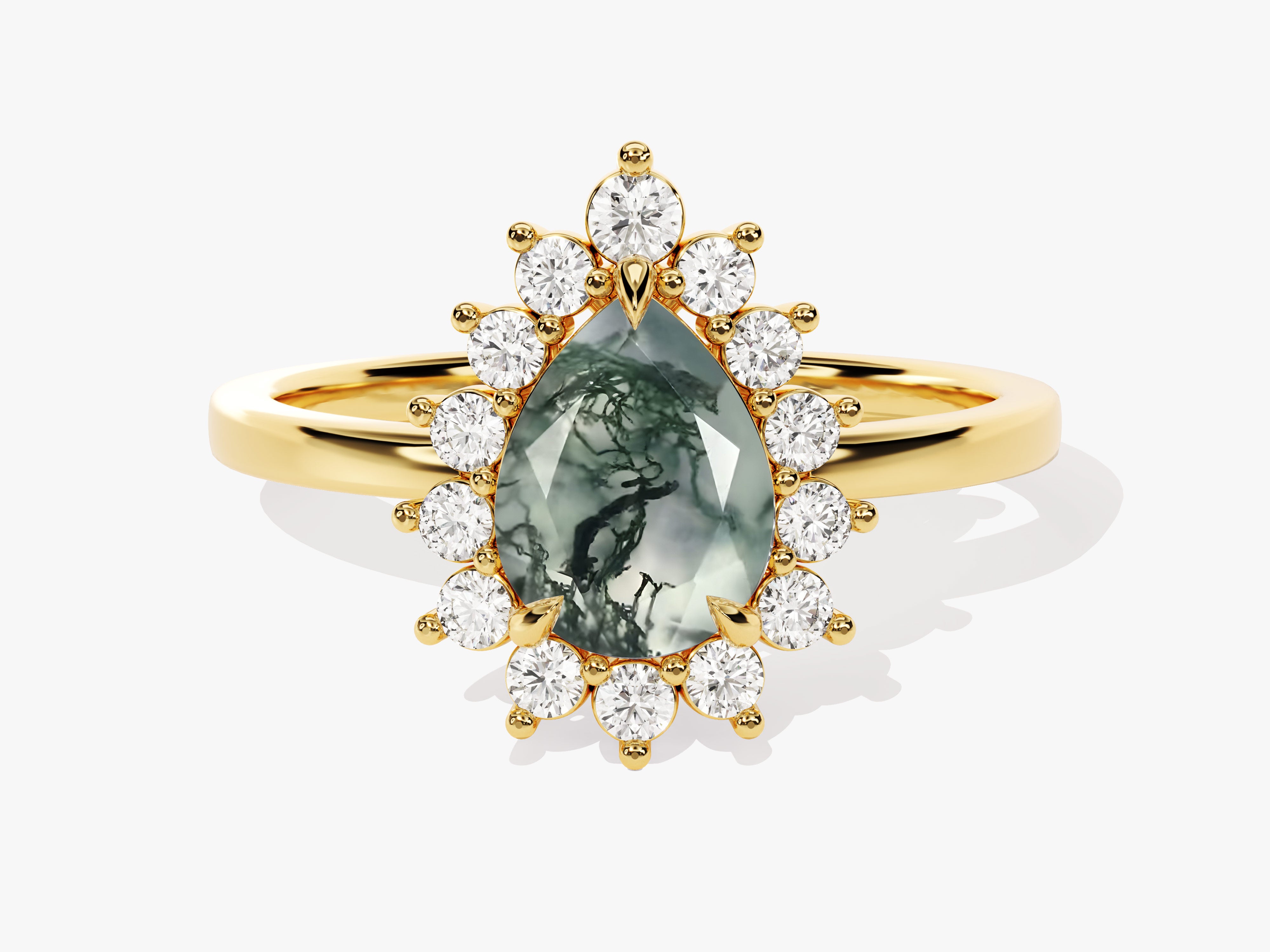 Gold ring with pear-shaped moss agate and diamond halo