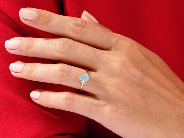 Pear Opal Engagement Ring with Round Moissanite Sidestones