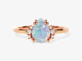 Pear Opal Engagement Ring with Round Moissanite Sidestones