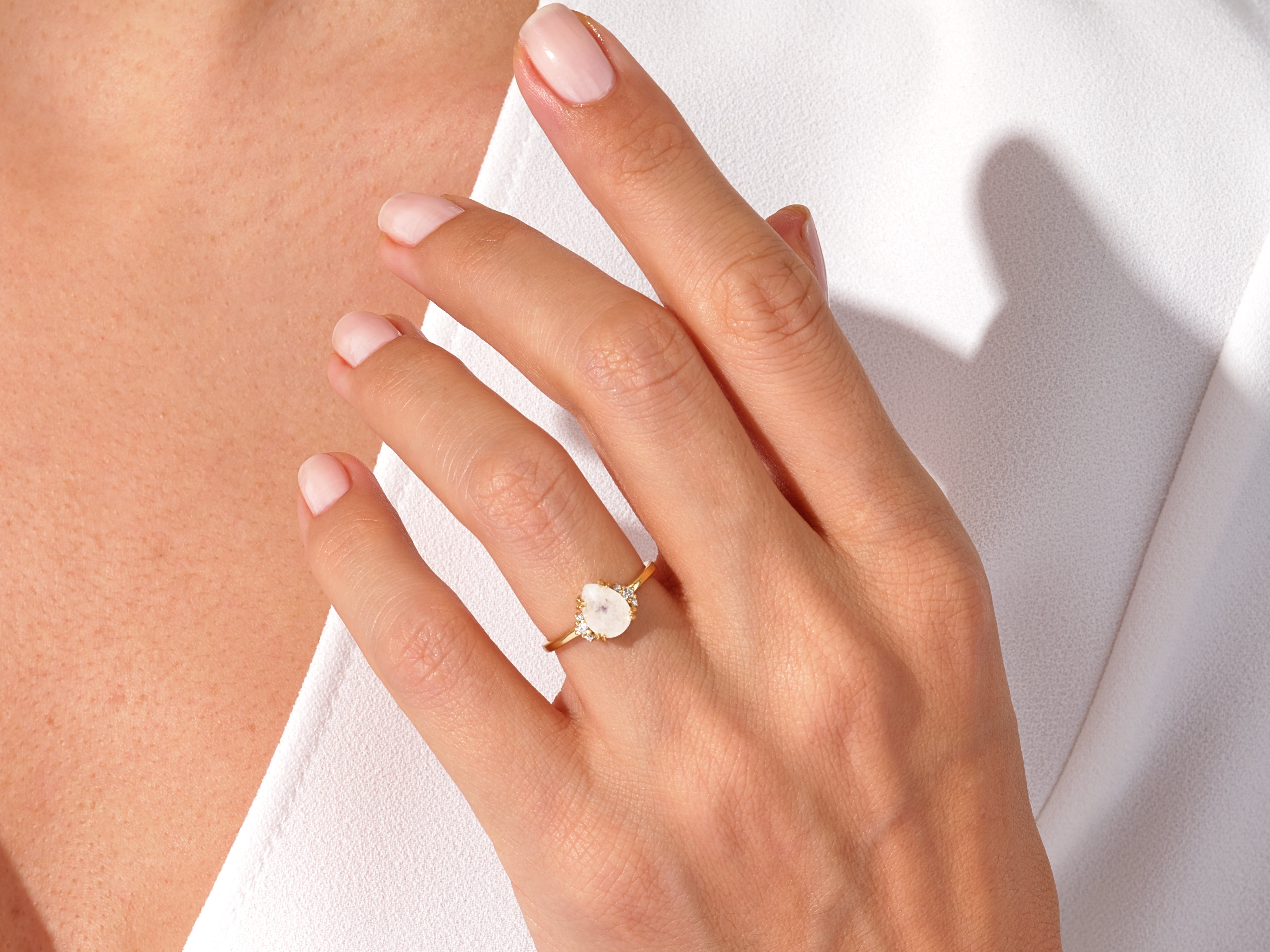 Pear Moonstone Engagement Ring with Round Moissanite Sidestones