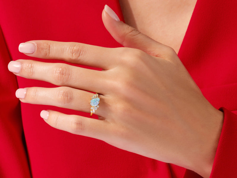 Pear Opal Engagement Ring with Round Moissanite Cluster