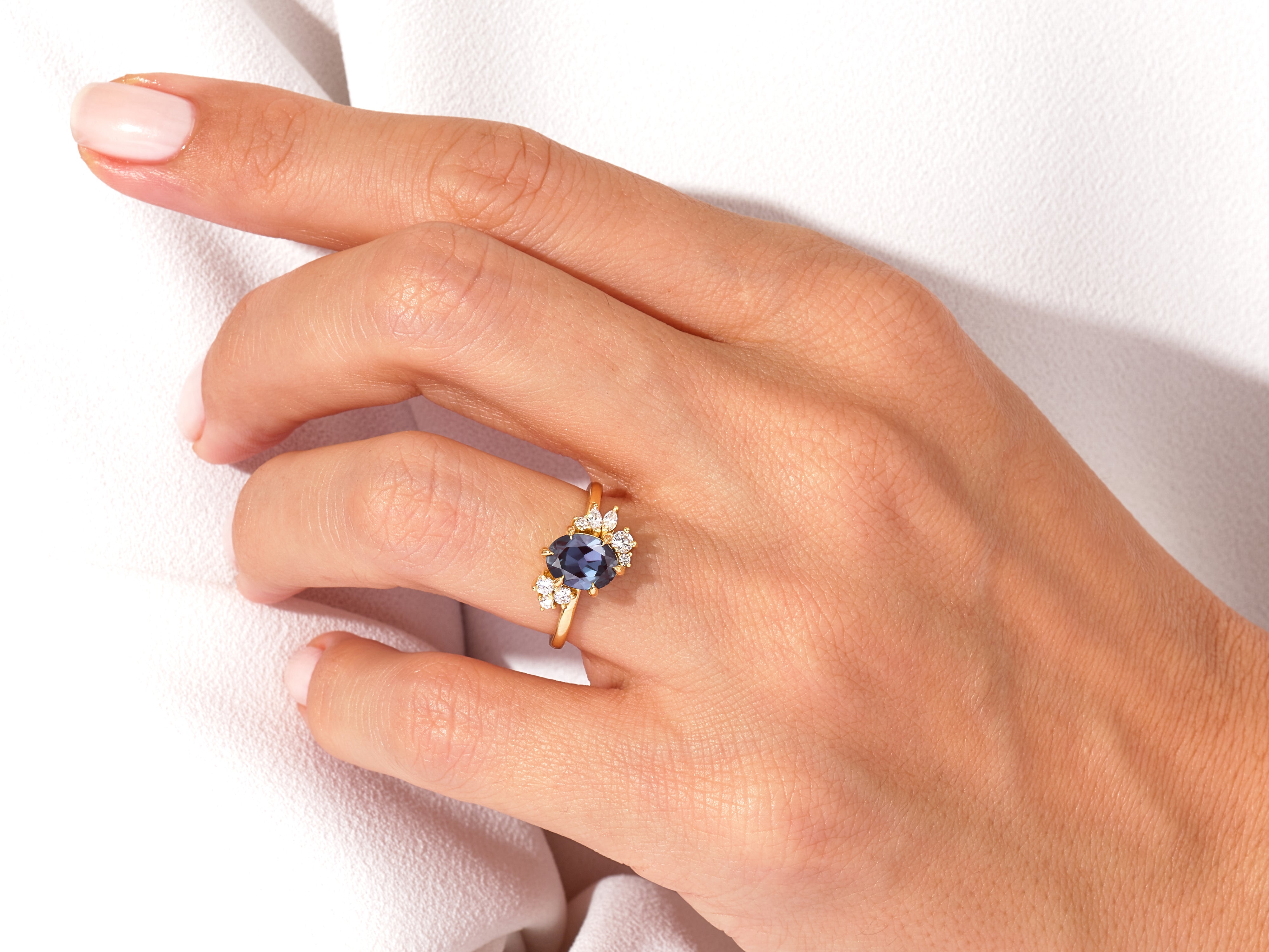 Oval Lab Alexandrite Engagement Ring with Round Moissanite Cluster