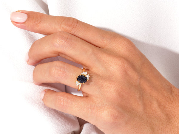 Oval Blue Sandstone Engagement Ring with Round Moissanite Cluster