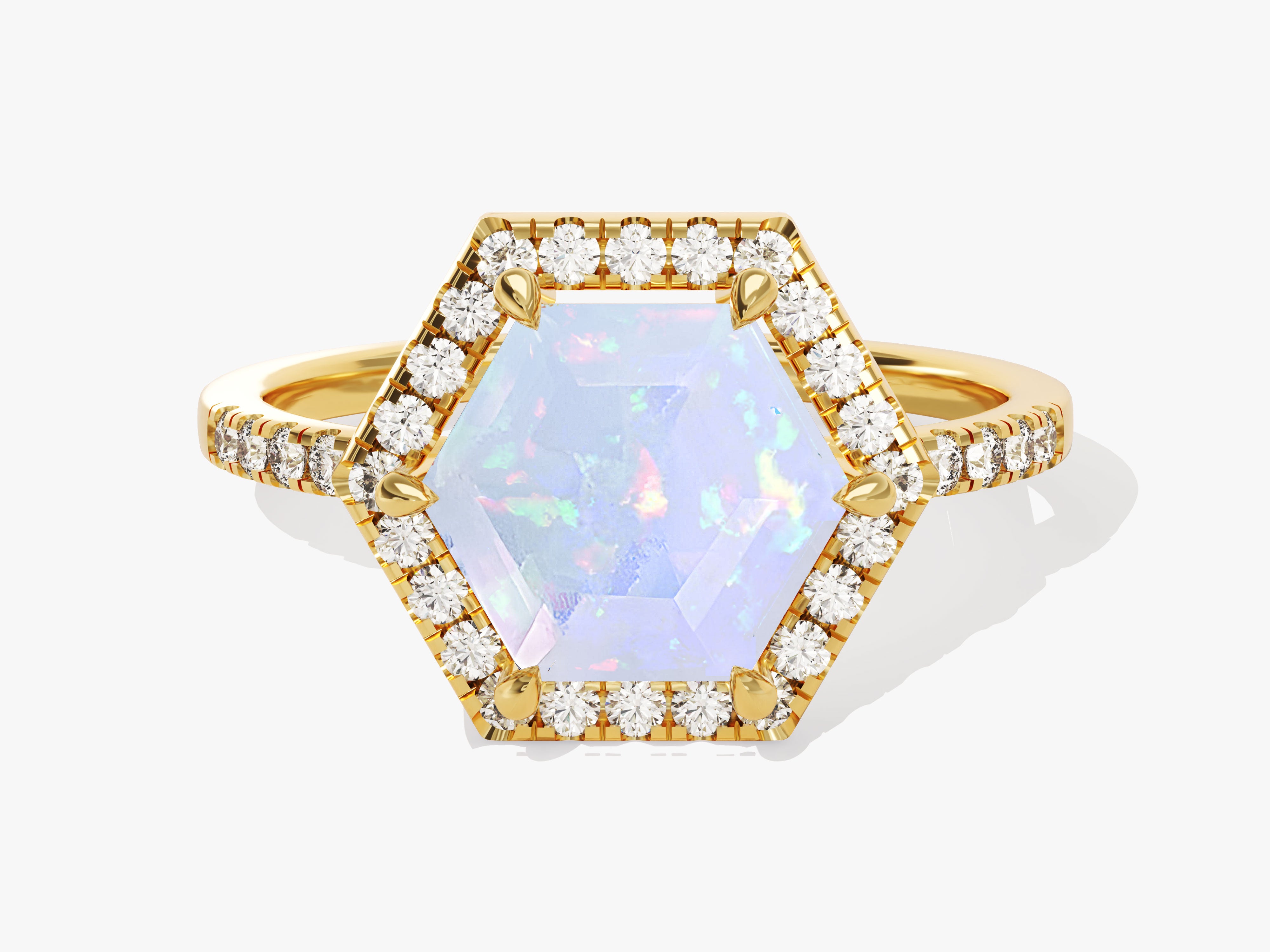 Hexagonal opal and diamond halo ring in yellow gold