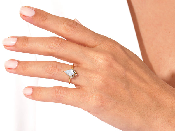 Kite Moonstone Engagement Ring with Baguette Moissanite Sidestones