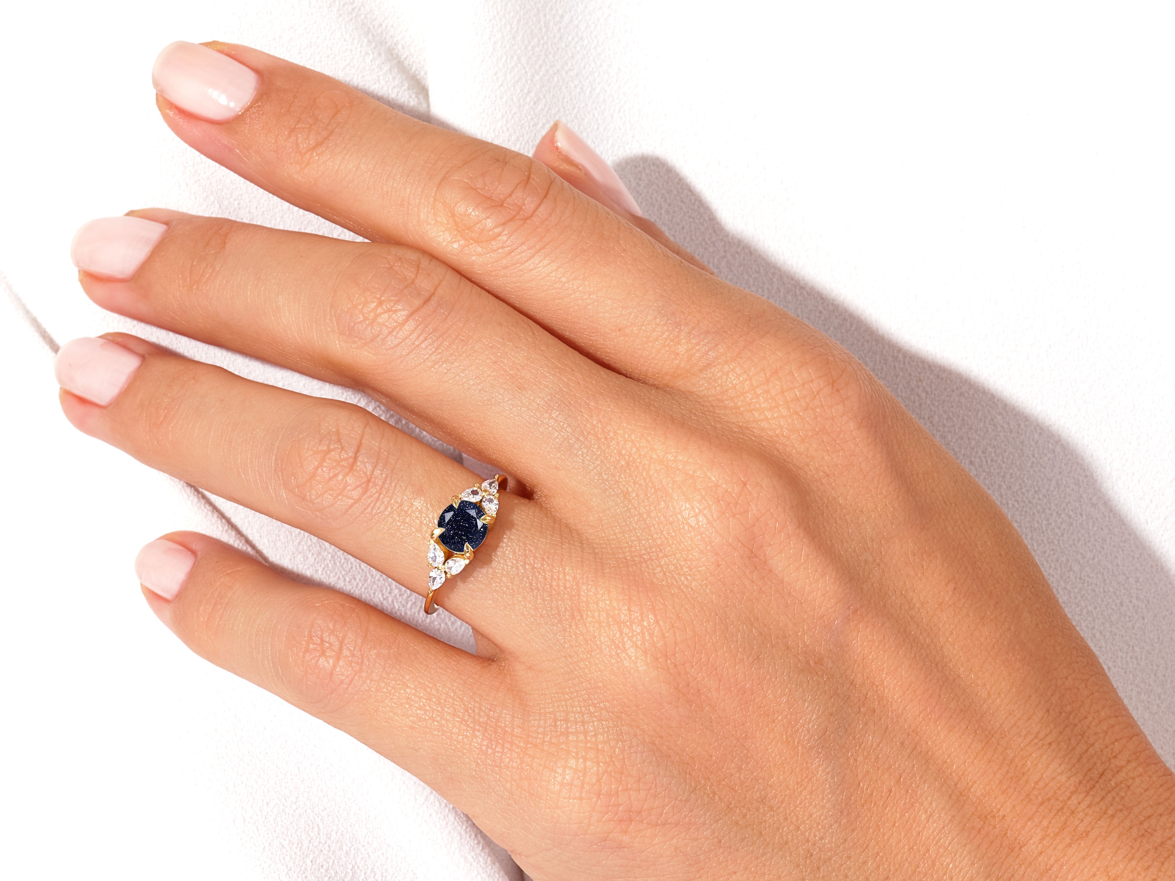 Round Blue Sandstone Engagement Ring with Pear Moissanite Sidestones