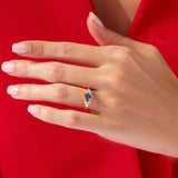 Round Lab Alexandrite Engagement Ring with Pear Moissanite Sidestones