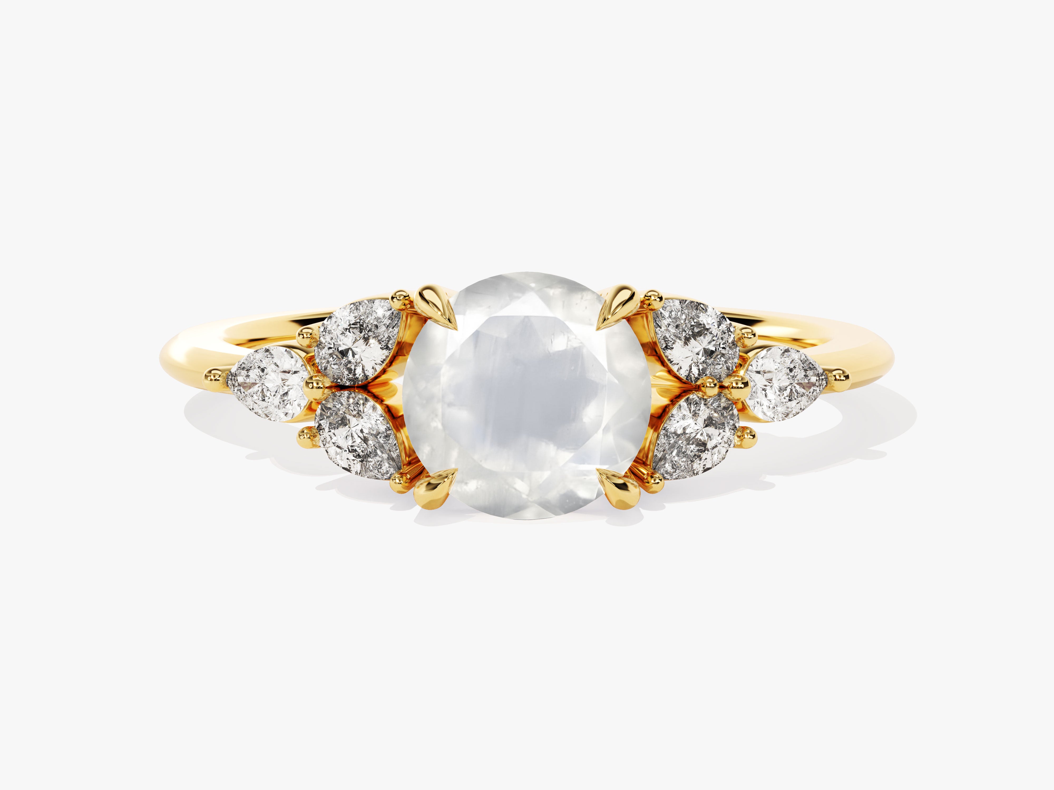 Gold ring with oval moonstone and diamond accents