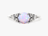 Round Opal Engagement Ring with Pear Moissanite Sidestones