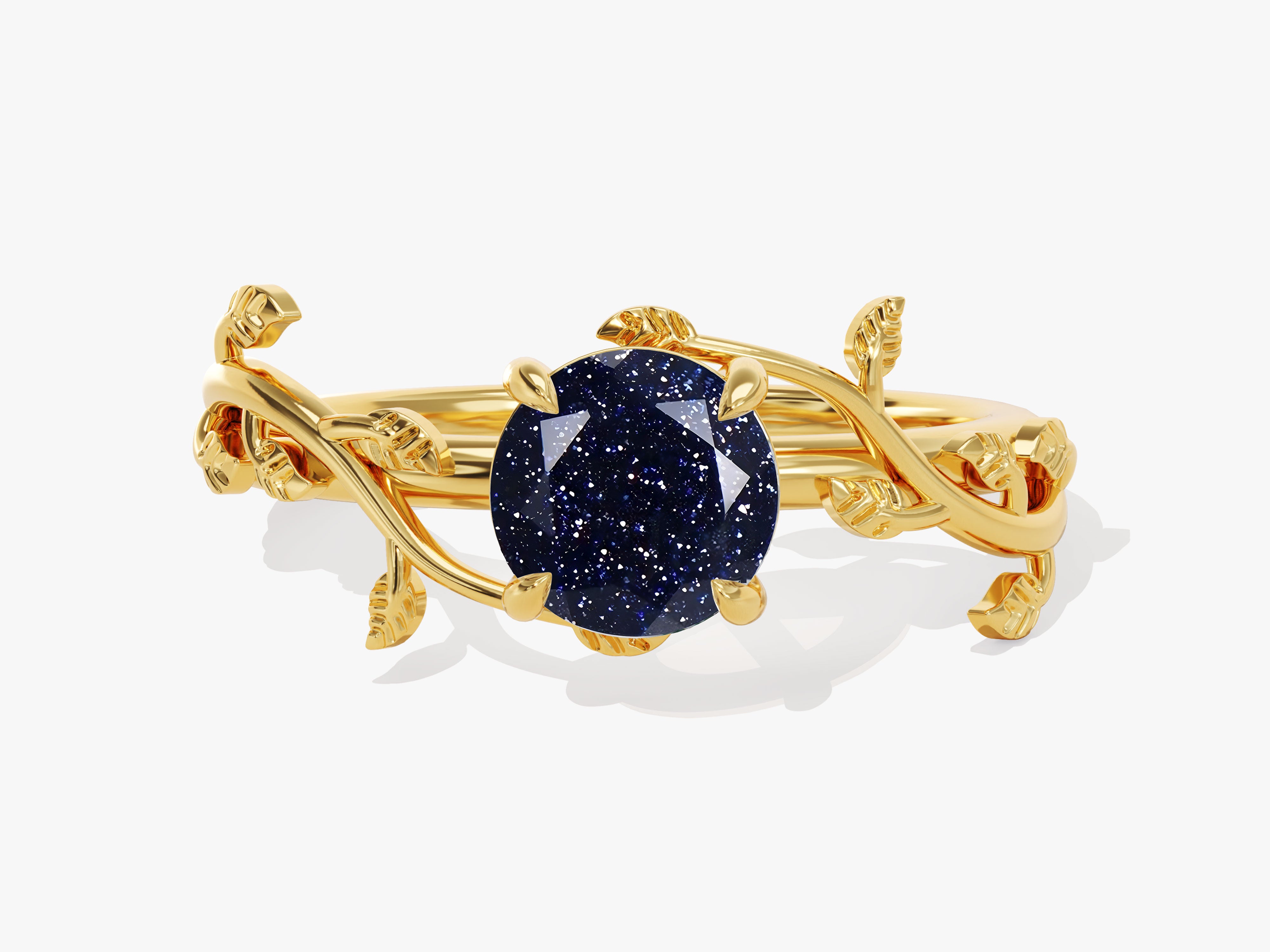 Gold ring with blue sandstone and leaf design