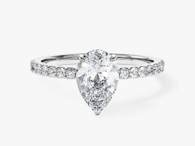 Sidestone Accent Pear Cut Moissanite Engagement Ring